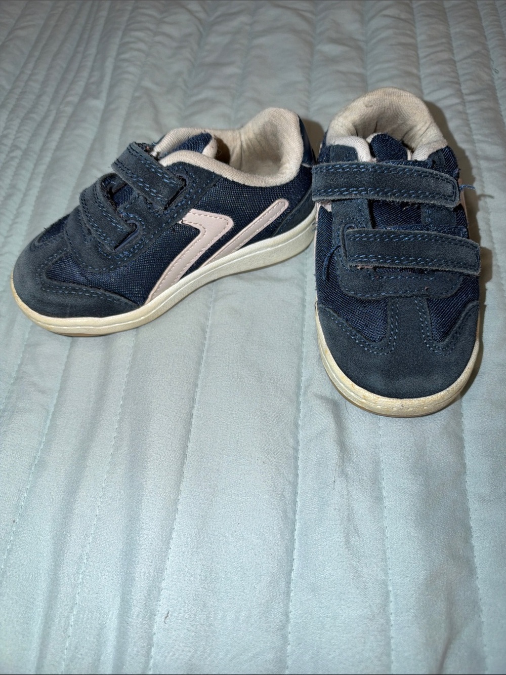 Cool retro-style navy and white suede and leather edged sneaker
